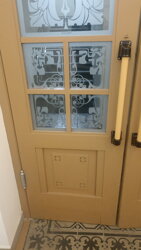 Pískovaná tabule skla ve dveřích