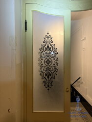 Praha  - pískování motivu na skleněné dveře dle přání zákazníka