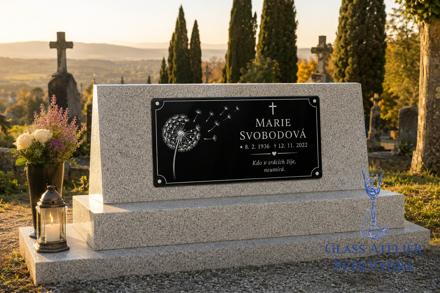 V 38. Černá náhrobní skleněná deska s nápisem a obrázkem pampelišky